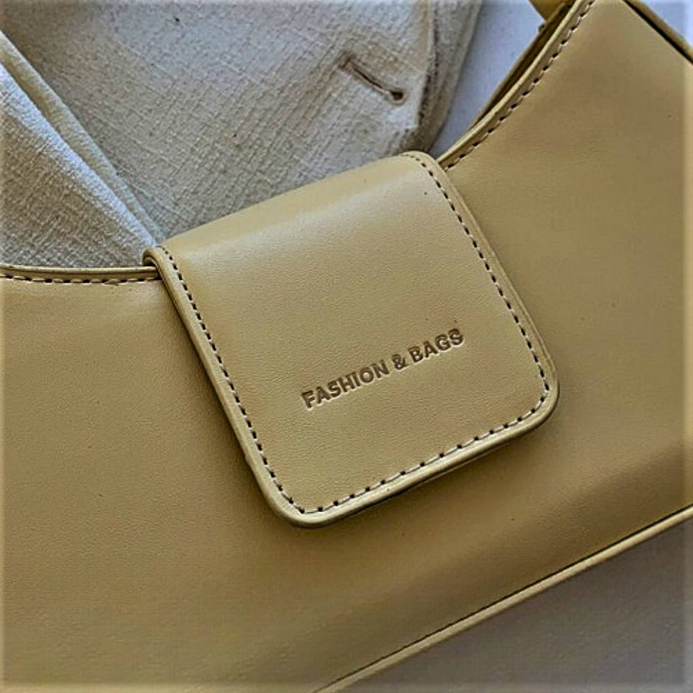 Bolso Mini Baguette Elegancia y Sofisticación en un Diseño Atemporal