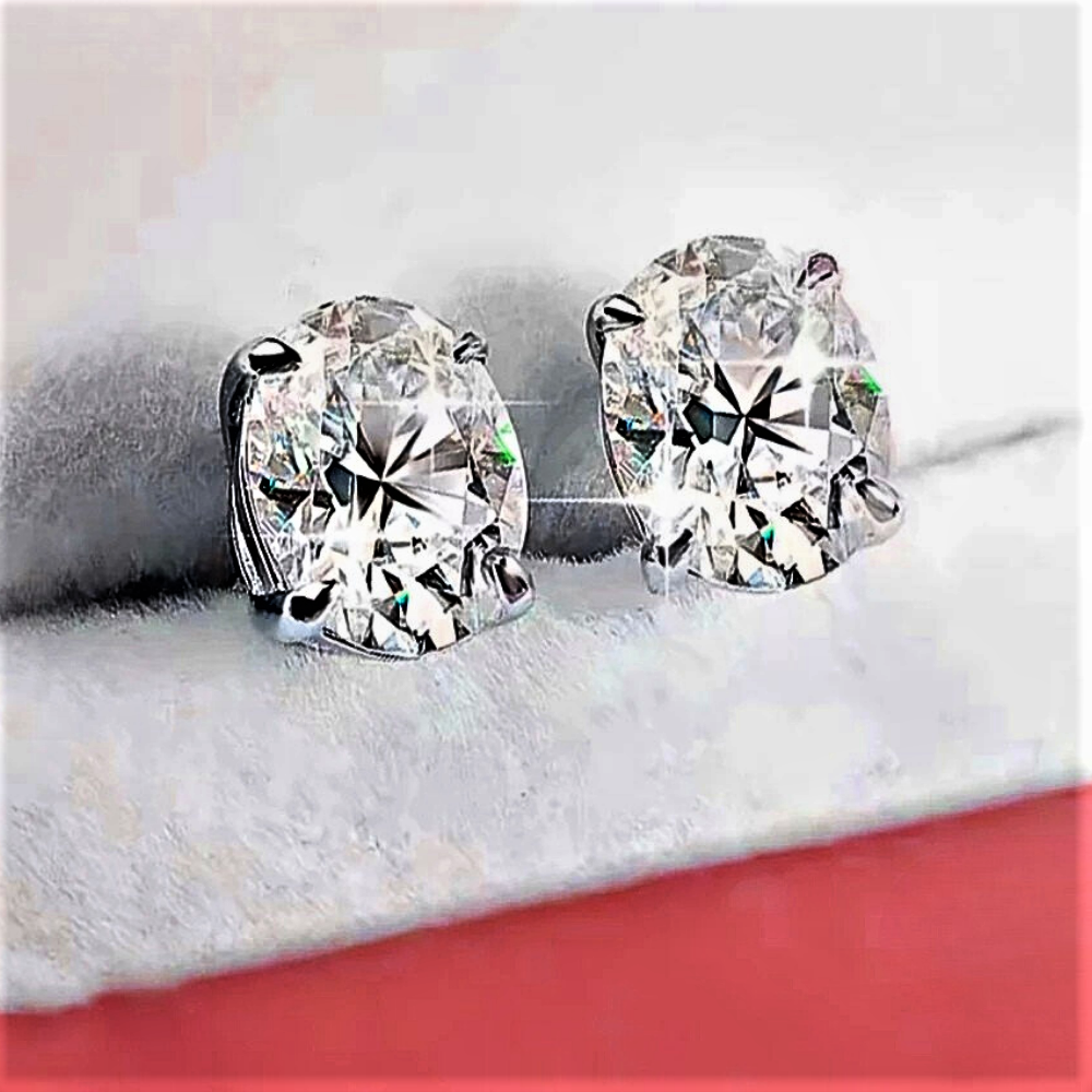Orecchini Punto Luce con Moissanite Ovale: Raffinatezza Pura in 4 Carature di Lusso