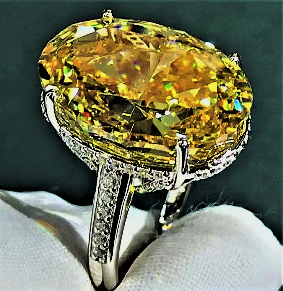 Fascione "Luce Infinita"con Zaffiro Ovale Giallo Intenso o Rosa in Moissanite da 30 carati