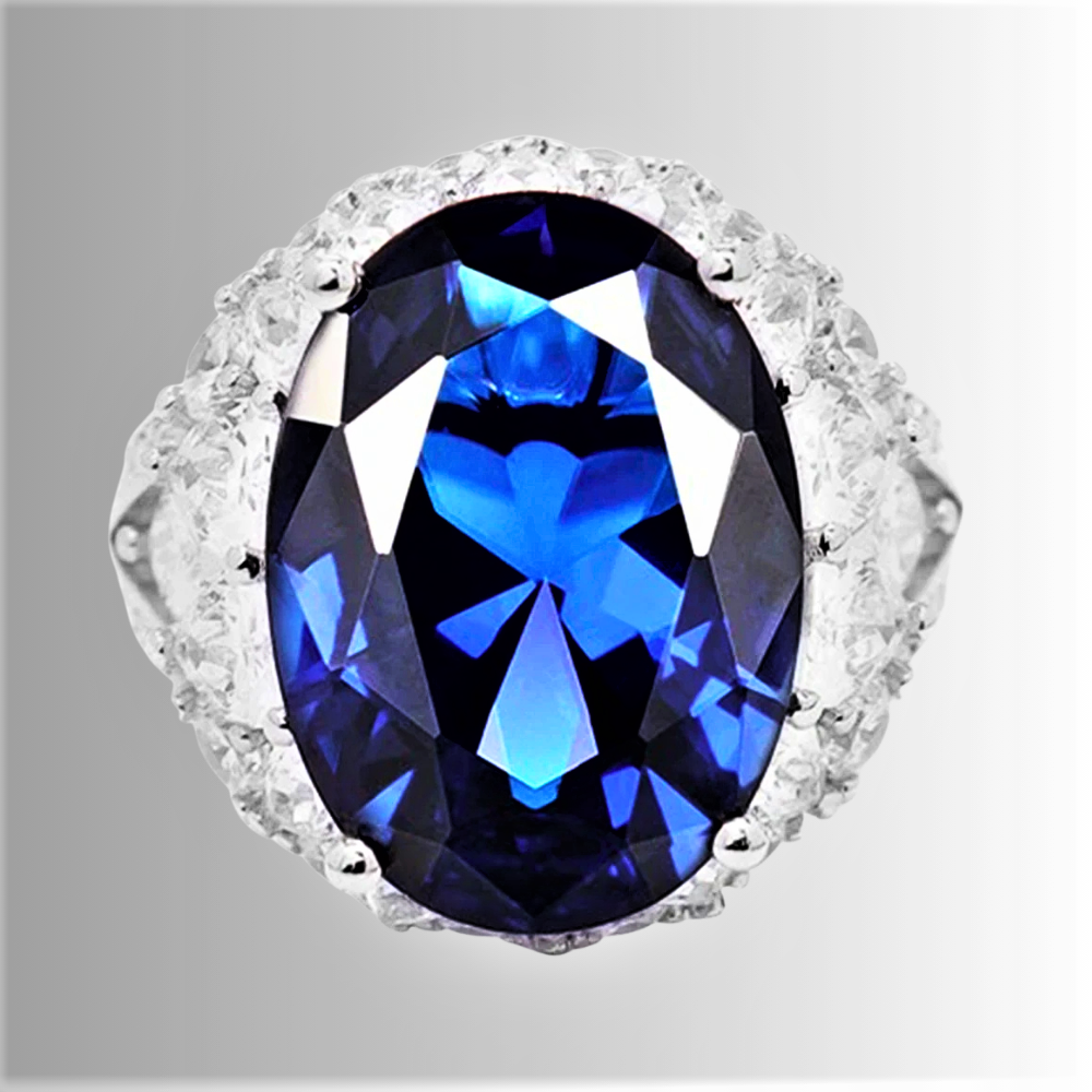 Fascione con Zaffiro Blu Coltivato Ovale e Diamanti Sintetici ad Alto Contenuto di Carbonio