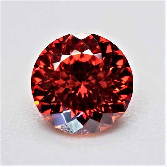 Moissanite Color Granato Taglio Brillante con 100 Faccette Certificata