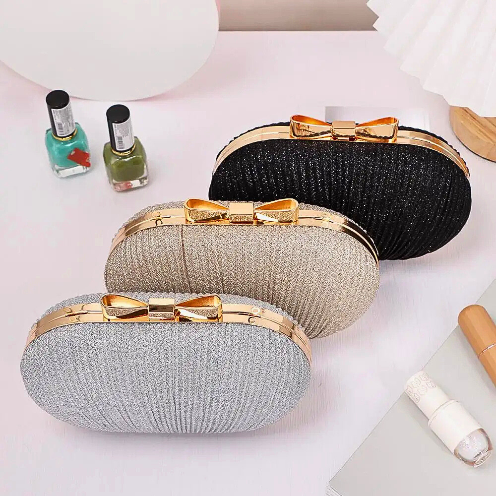 Clutch a Ovetto con Chiusura a Fiocco