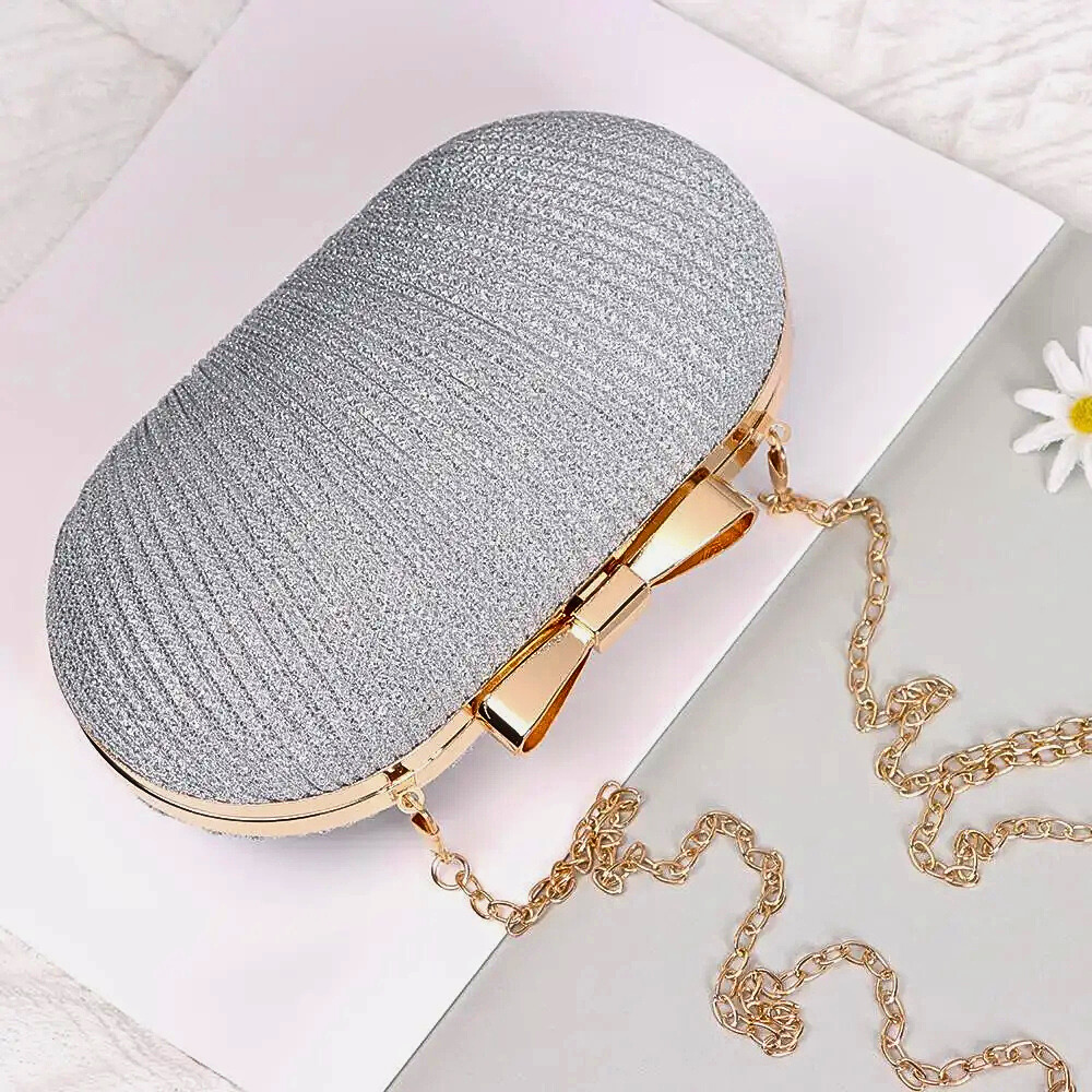 Clutch a Ovetto con Chiusura a Fiocco