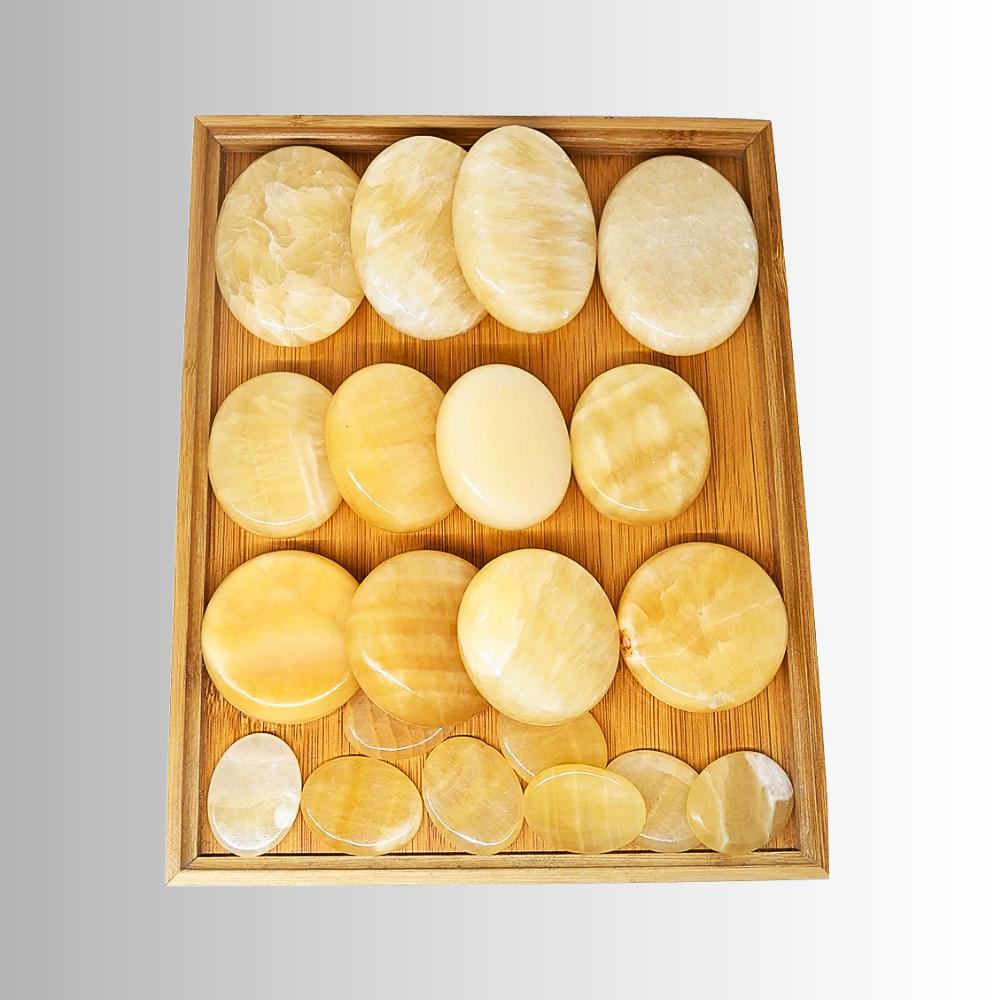 Set di 20 Pietre da Massaggio in Topazio Naturale con borsa riscaldante