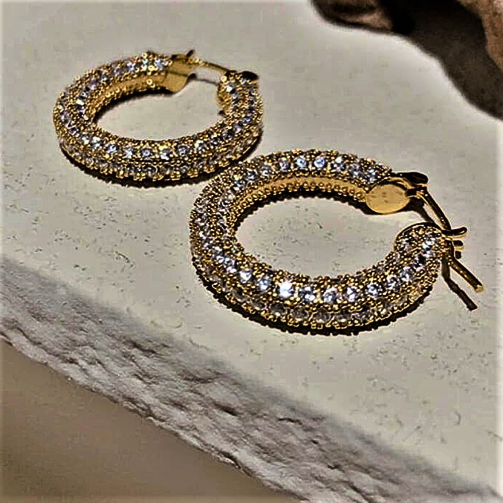 "Raggi Lucenti" - Pendientes de aro de la colección Eleganza