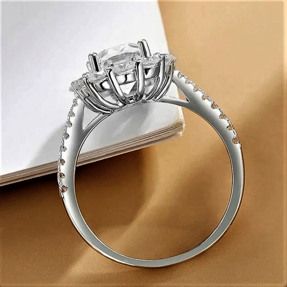 Anello a Fiore con Moissanite Ovale 3ct: Grazia, Luce e Fascino Infinito
