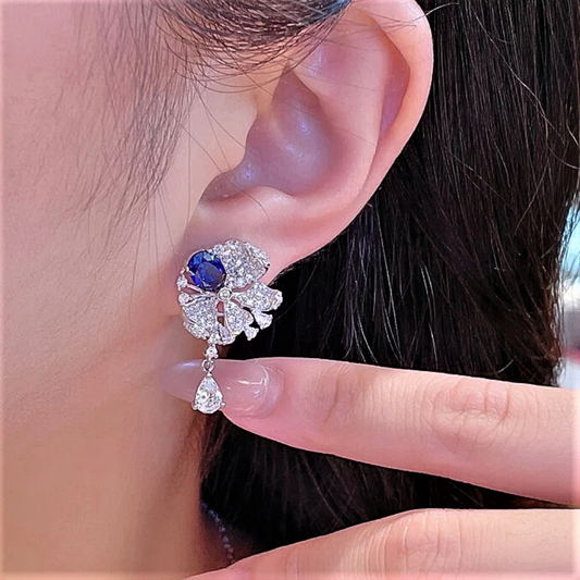 Orecchini con Zaffiri Blu Ovali Coltivati e Diamanti Lab Grown