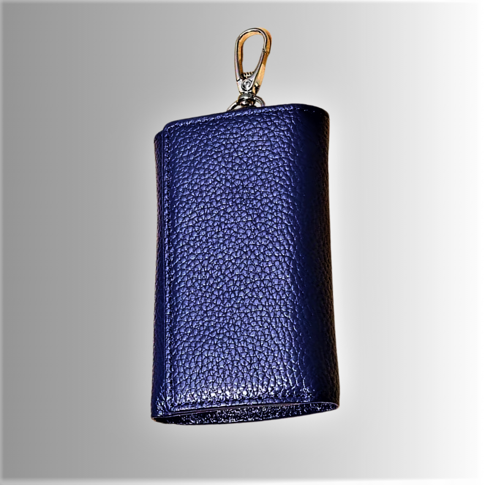 Portafoglio e Portachiavi in Pelle di Vitellino: Innovazione, Qualità e Lusso in un Unico Accessorio