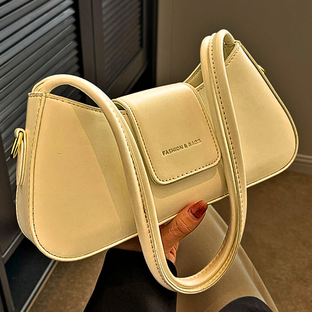 Bolso Mini Baguette Elegancia y Sofisticación en un Diseño Atemporal 