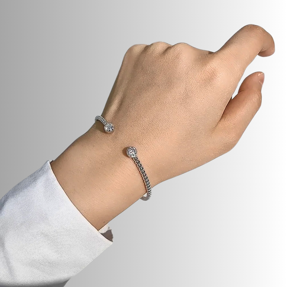 Bracciale Rigido Aperto con due Moissaniti da ct 0.50