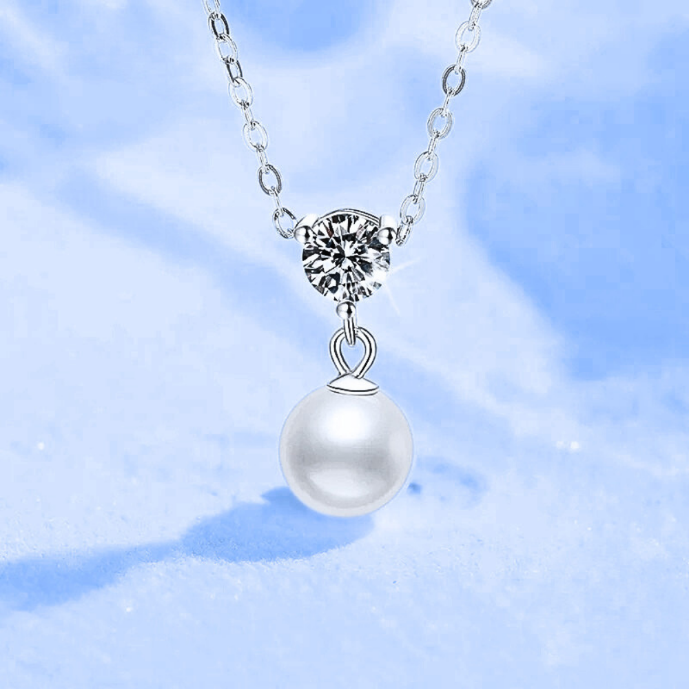 Collana con Moissanite di ct 0,50 e Perla Naturale