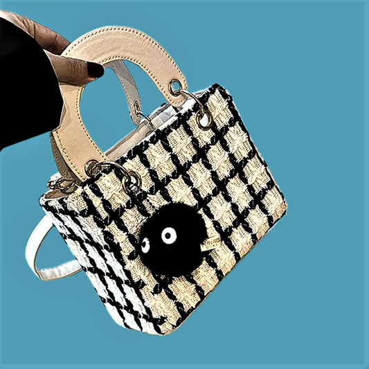Mini Bolso de Lana Elegancia y Diseño Innovador