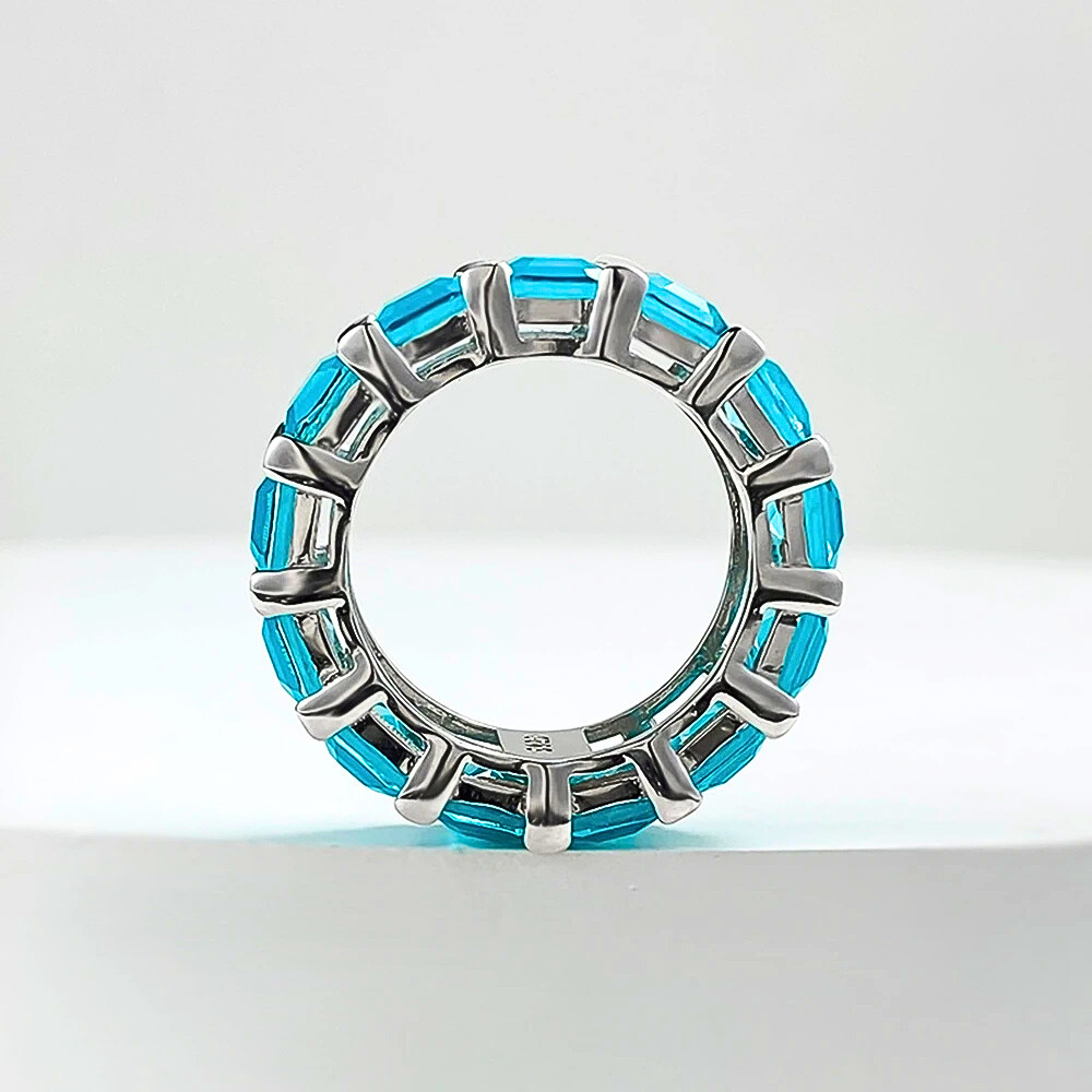 Eternity con Tormalina Paraiba o Smeraldo Colombiano Lab Grown Taglio Smeraldo