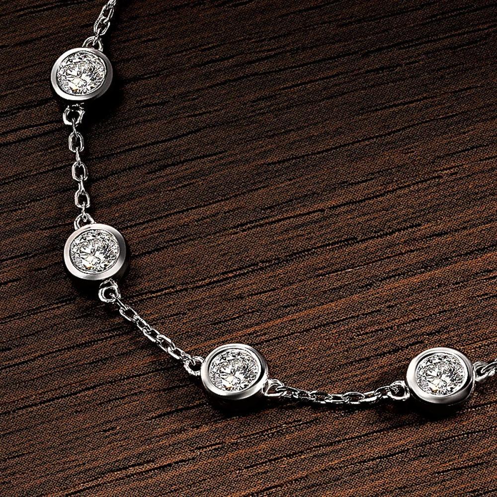 Bracciale con  8 castoni tondi con Ct 2,40 di Moissanite D Color