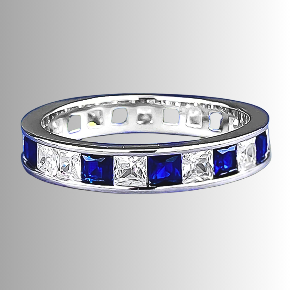 Fede Eternity a binario con Zaffiri e Diamanti Sintetici ad Alto Contenuto di Carbonio Taglio Princess