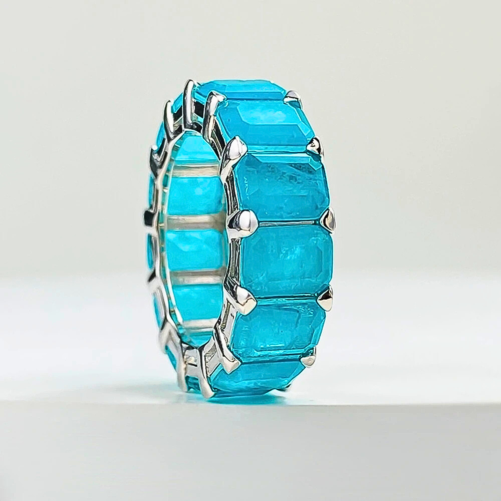 Eternity con Tormalina Paraiba o Smeraldo Colombiano Lab Grown Taglio Smeraldo