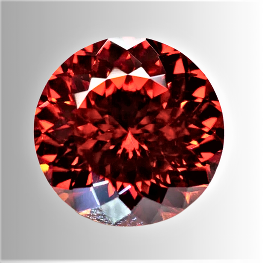 Moissanite Color Granato Taglio Brillante con 100 Faccette Certificata