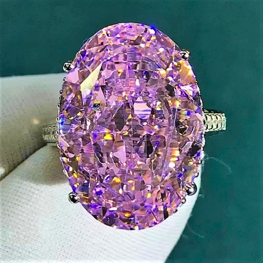 Fascione "Luce Infinita"con Zaffiro Ovale Giallo Intenso o Rosa in Moissanite da 30 carati