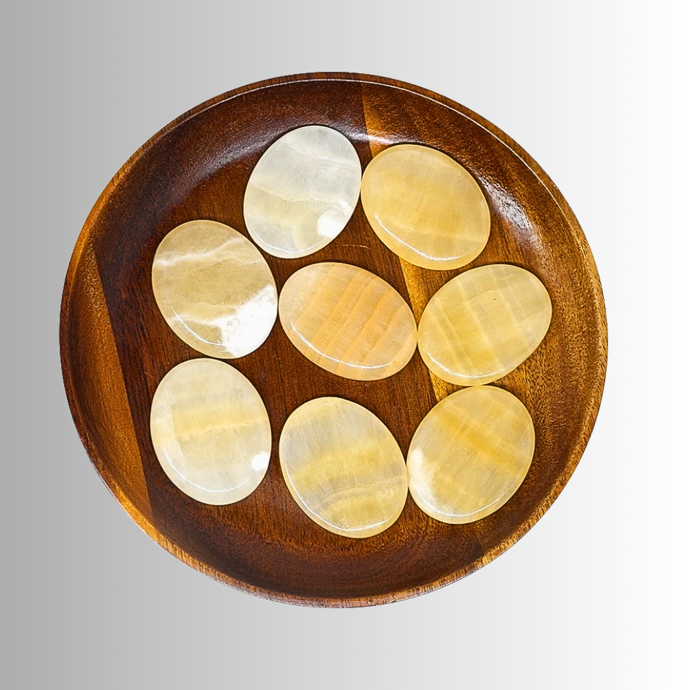 Set di 20 Pietre da Massaggio in Topazio Naturale con borsa riscaldante