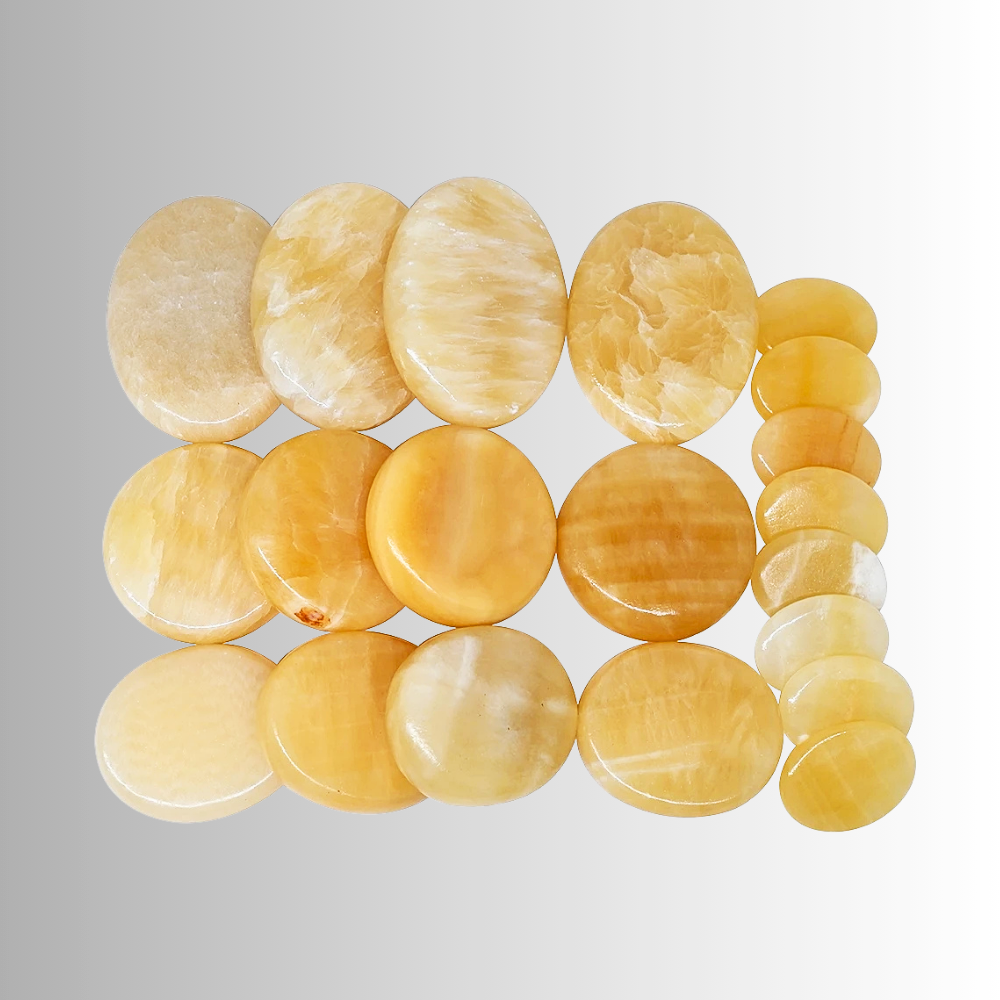 Set di 20 Pietre da Massaggio in Topazio Naturale con borsa riscaldante