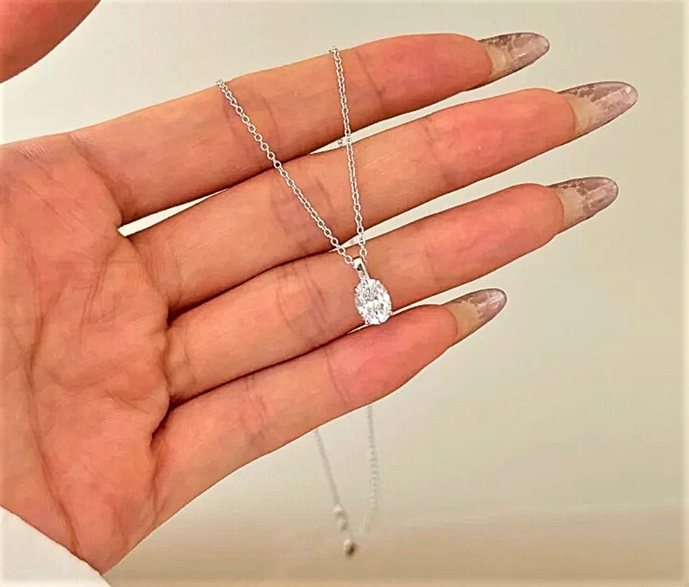 Collana Punto Luce con Moissainite Taglio Ovale Certificata