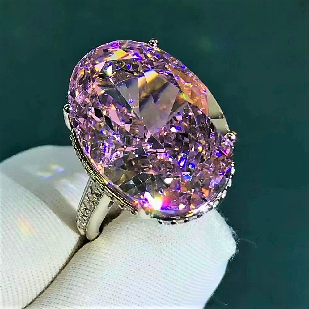 Fascione "Luce Infinita"con Zaffiro Ovale Giallo Intenso o Rosa in Moissanite da 30 carati