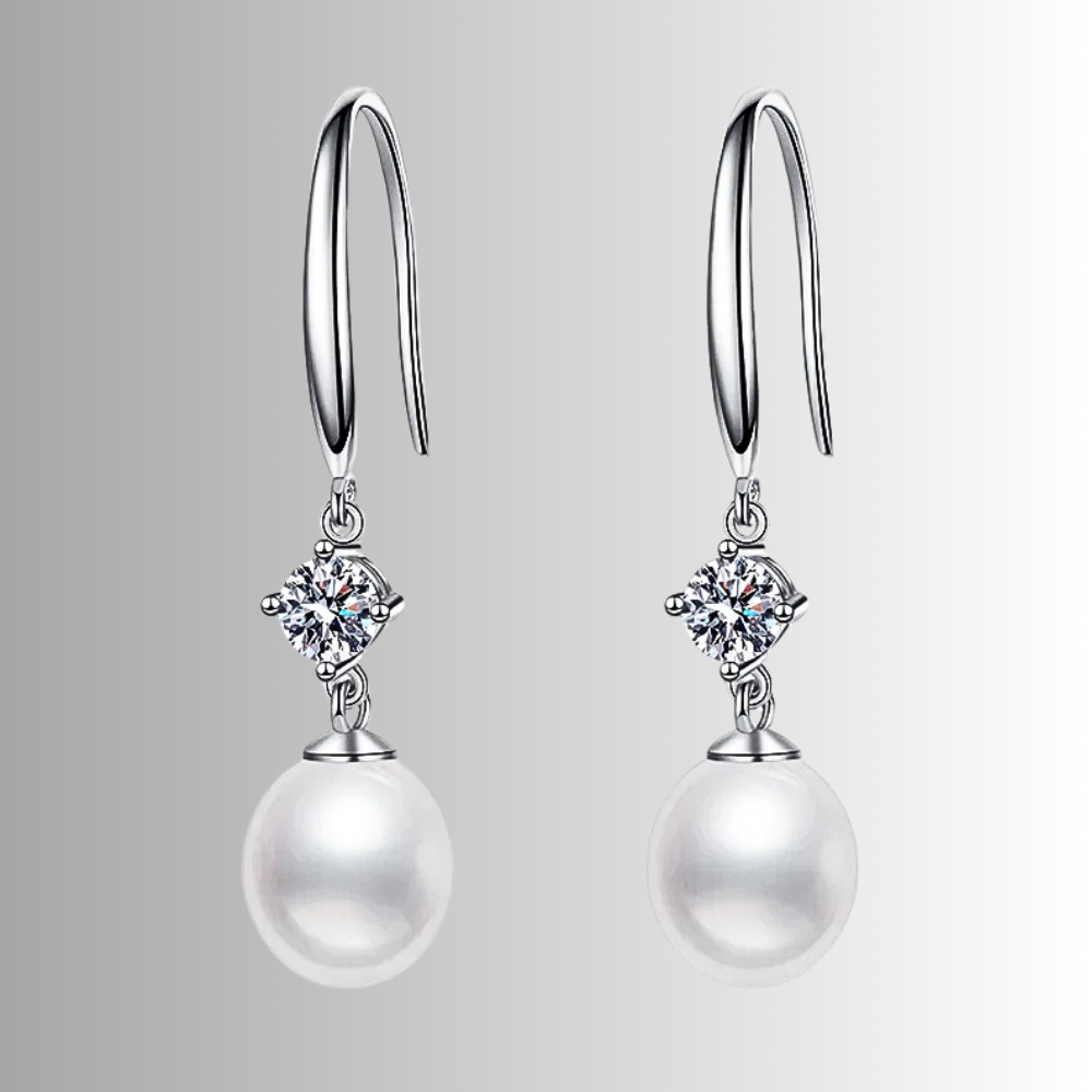 Orecchini con Moissaniti per ct 0,60 e Perle a Goccia
