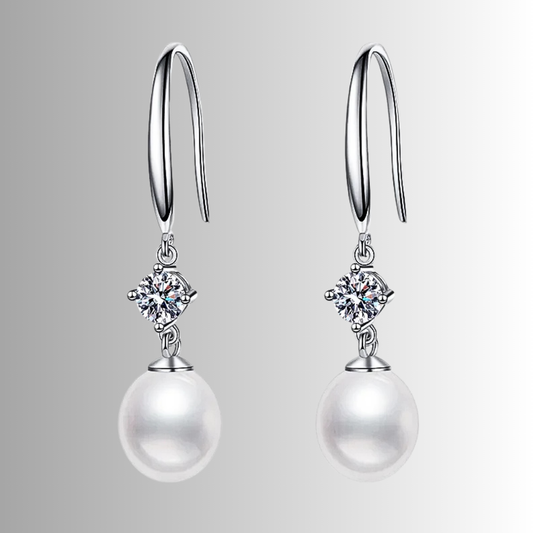 Orecchini con Moissaniti per ct 0,60 e Perle a Goccia
